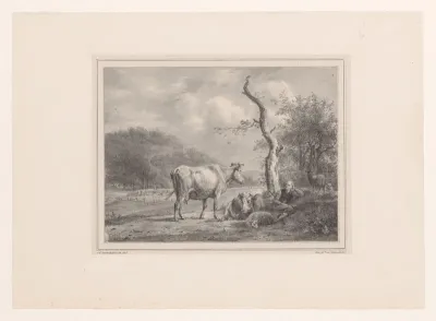 Herder met vee in een wei