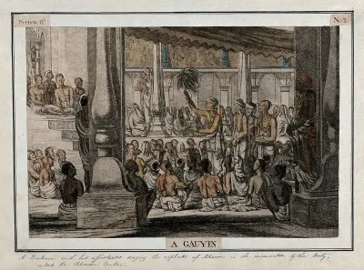 Hindu priest, or brahmin, and assistants, singing to a seated audience, Calcutta, West Bengal