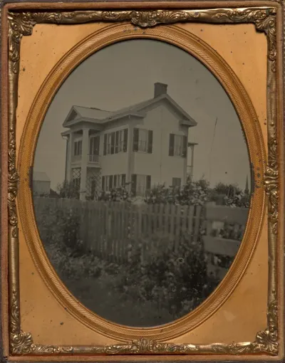Homestead with picket fence and flowers