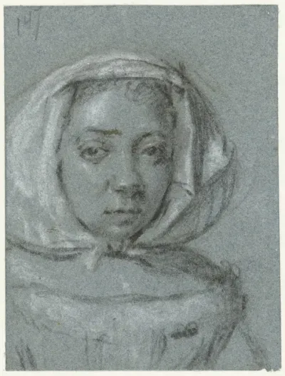 Hoofd van een jonge vrouw met een hoofddoek