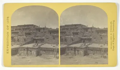 Indian Pueblo of Zuni, New Mexico; view from the interior. The "Pueblo" or town, encloses a quadrangular area within which are the ruins of a church built under the direction of the Jesuit missionaries. The houses are built one above the other to the