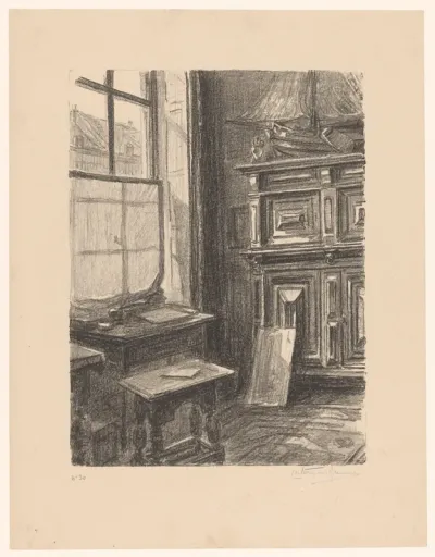 Interieur van een atelier met een tafel bij het venster