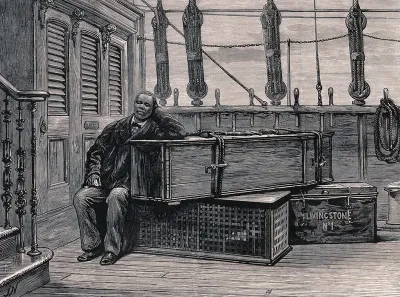 Jacob Wainwright sitting next to the coffin of David Livingstone on board ship