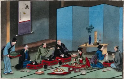 Japanese funeral customs: in the house of the dead man, relatives share a meal with a Buddhist monk