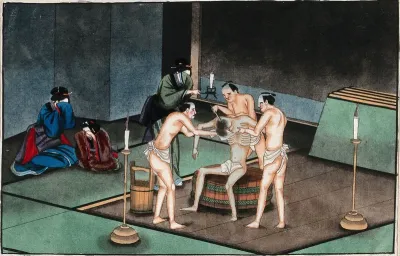 Japanese funeral customs: two attendants wearing loin-cloths support the body of a dead man while a third shaves his head