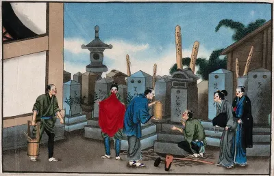 Japanese funeral customs: watched by two mourners, an attendant prepares to place the urn containing the ashes in the opened grave