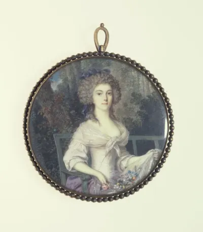 Jeune femme assise sur un banc
