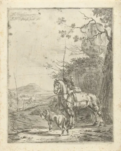 Jonge man met een paard en een hond