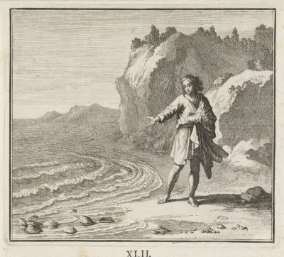 Jongeling aan een strand bekijkt schelpen