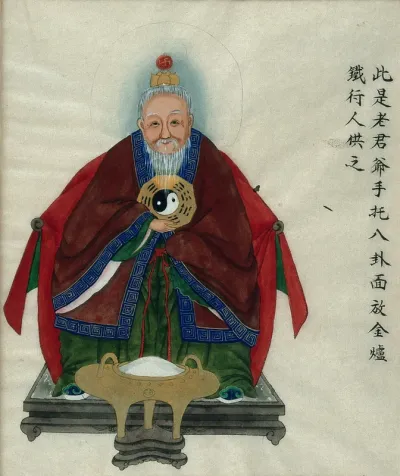 Kau Jun, the 'venerable gentleman', wearing traditional costume, holding the 'Eight Trigrams' and 'Yin and Yang' symbol