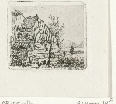 Kippen bij een boerenschuur