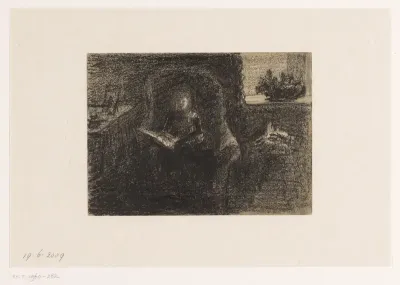 Klein meisje in een grote rieten stoel in interieur
