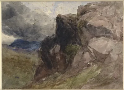 Klippelandskab i Wales, i forgrunden til højre ses en siddende figur