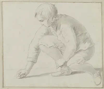 Knikkerende jongen