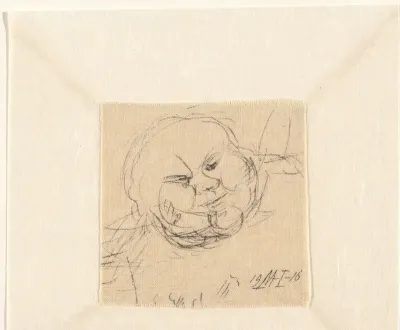 Kop van een figuur met bolle wangen