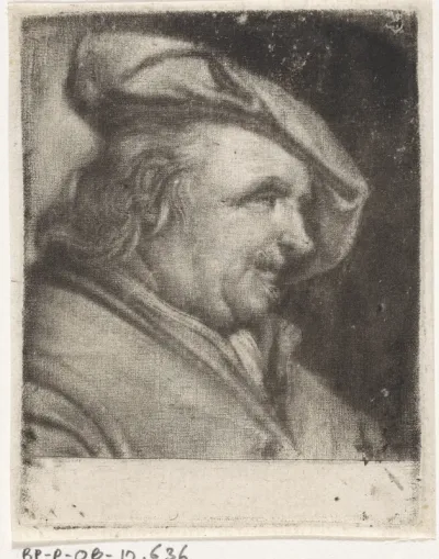 Kop van een man met een baret, naar rechts