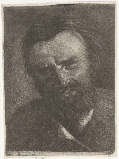 Kop van een man met een korte baard