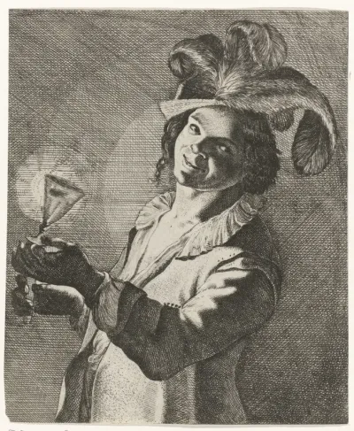 Lachende jongen met een glas in de hand