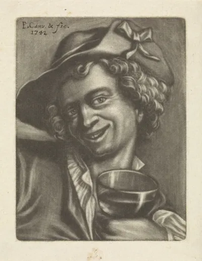 Lachende jongen met een glas