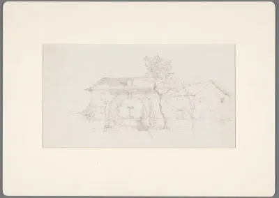 Landhuis met een berceau over het tuinpad