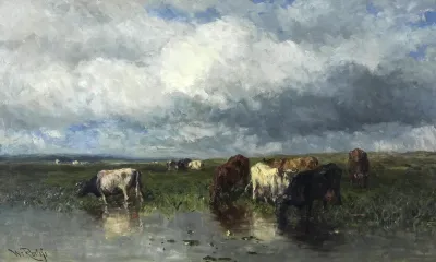Landscape with cows at the waterfront