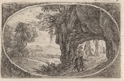 Landschap met een pad door een rots