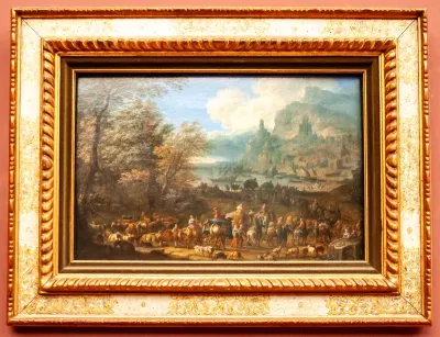 Landschap met figuren bij een inham aan de zee