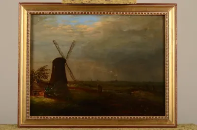 Landschap met molen in een opkomende bui