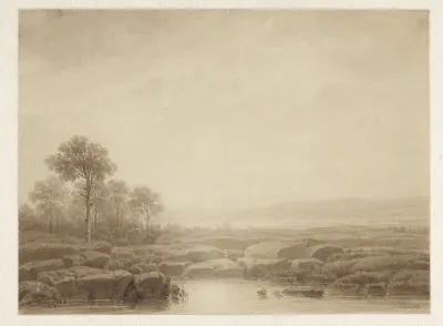 Landschap met rotsen bij water