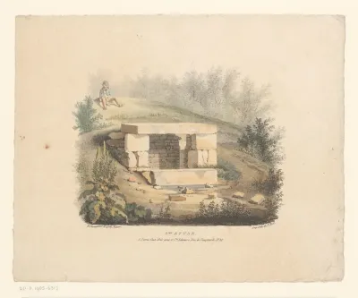 Landschap met stapel stenen en zittende man