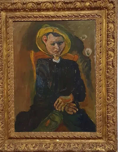 Le petit garçon au chapeau jaune