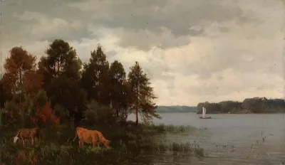 Lehmiä järven rannalla