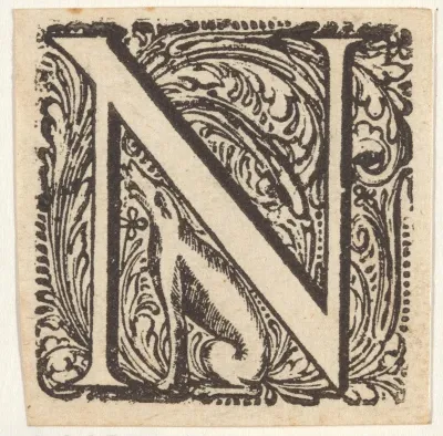 Letter N in een omlijsting met een wolf of een hond