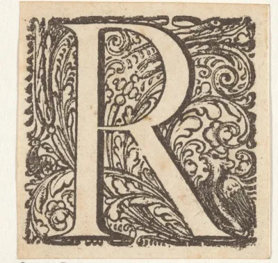 Letter R in een omlijsting met een vogel