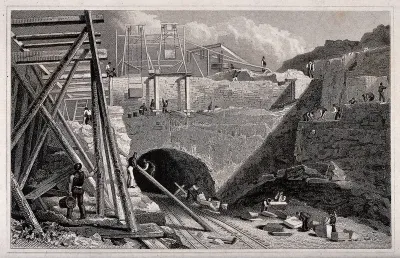 Liverpool: a railway tunnel cut into the mountain side with men working on scaffolding above and cutting stone below