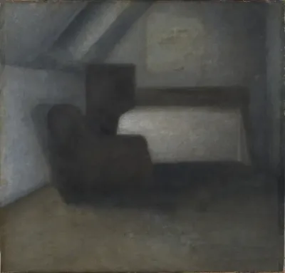 Loftværelse med bord og stol