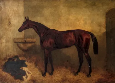 Lord Clifden in a stable with a kitten on a blanket