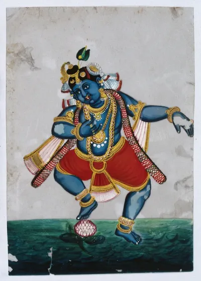 Lord Krishna, a blue skinned Hindu deity dancing on a lotus