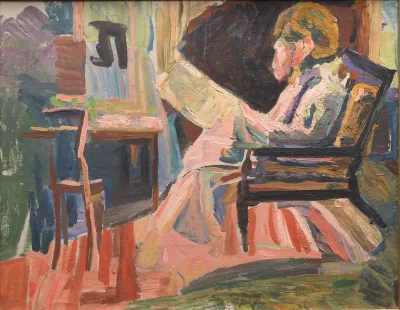 Læsende, hel figur, profil