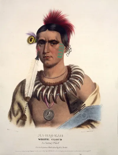 Ma-hos-kah (White Cloud), a chief of the Iowa tribe, with facial tattooes and a bear's claw necklace