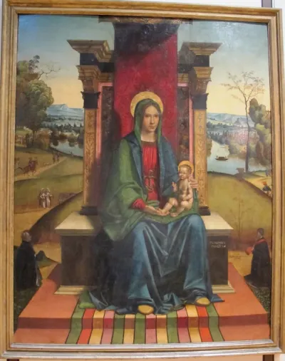 Madonna and Child enthroned with two donors