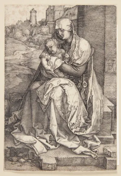 Madonna, siddende ved en mur