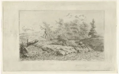 Man bij een waterval
