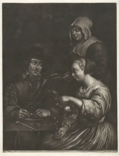 Man en een vrouw aan tafel