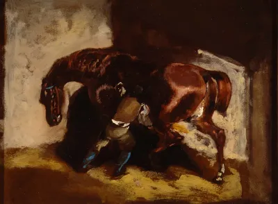 Man Grooming a Horse