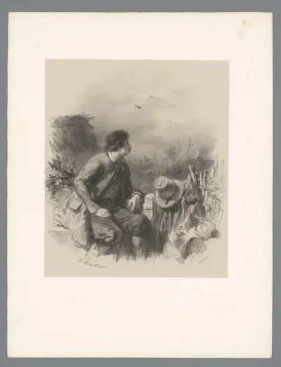 Man in een veld kijkt uit over het landschap