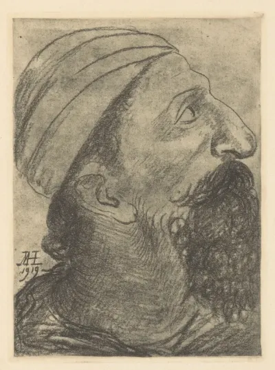 Man met baard en muts en profil