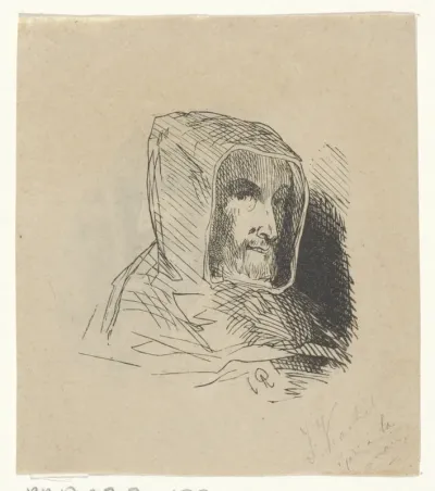 Man met een capuchon en een baard