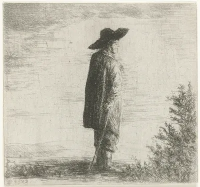 Man met hoed en stok in landschap