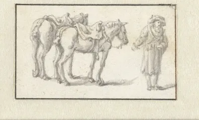 Man staand naast twee paarden